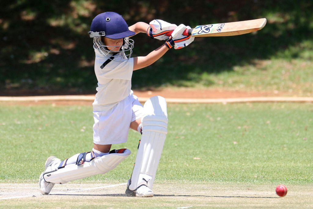 Boy in Full Cricket Gear